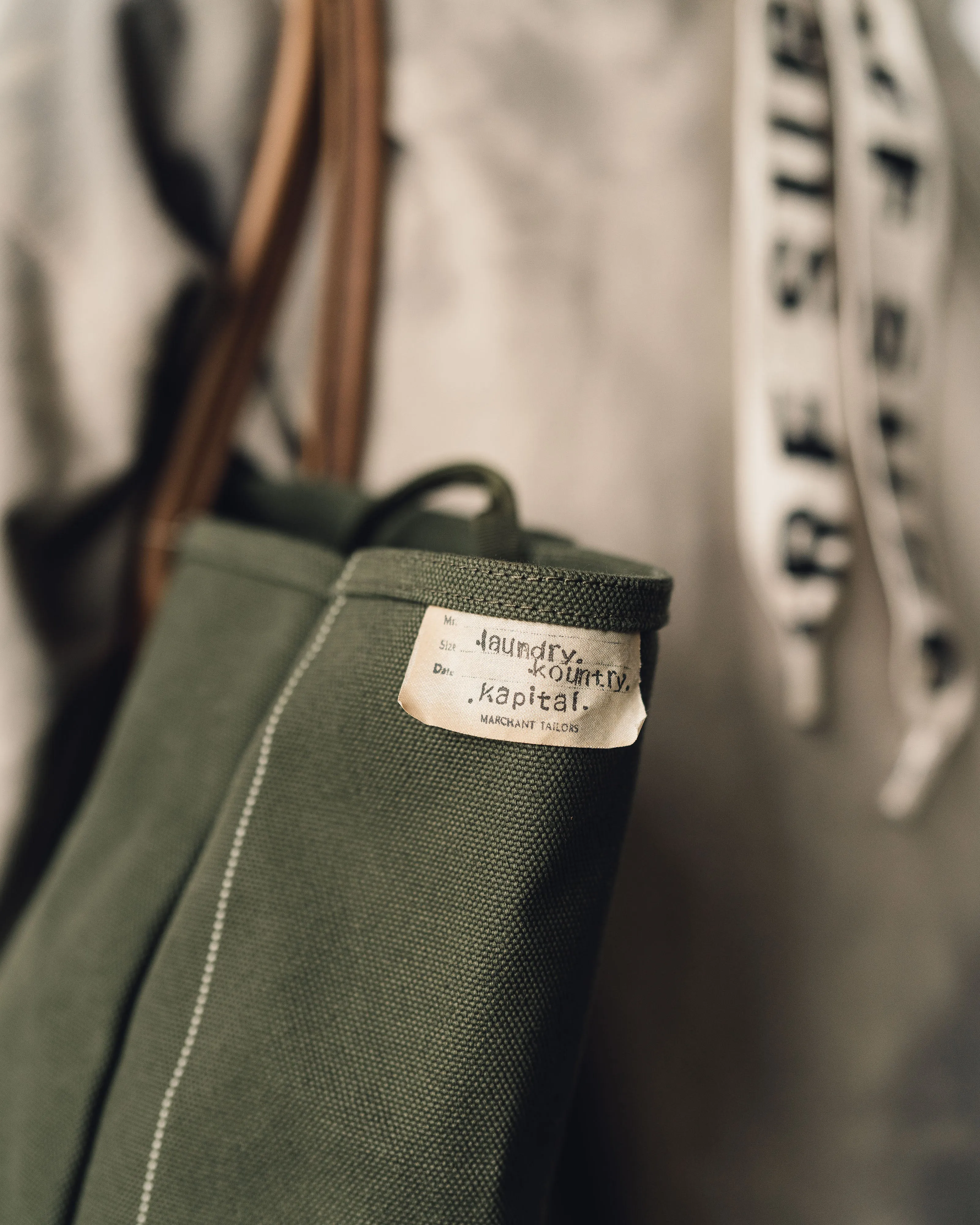 Kapital Large Rainsmile Milk Bag, Khaki